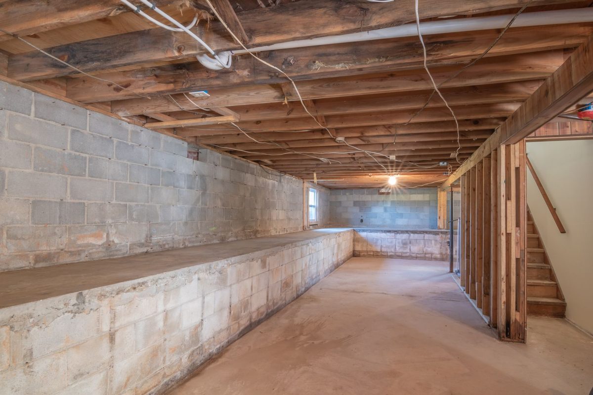 Standing water across a flooded room floor, the kind of water damage extraction addresses